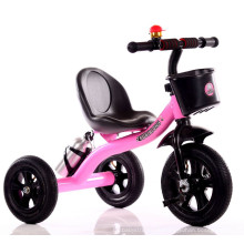 Triciclo de los niños encantadores rosados ​​del triciclo de los niños